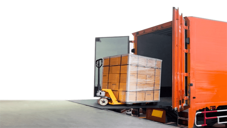The back of an open tractor trailer truck with a pallet jack unloading a pallet of boxes
